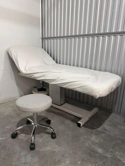 Adjustable facial bed with chair