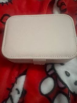 Pink Jewelry Box With Various Jewelry Pieces