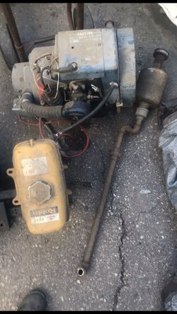 Generator with gas tank and muffler.