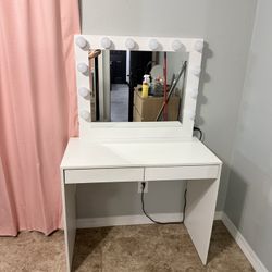 White vanity with mirror 