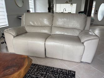 Ivory leather couch from Ashley