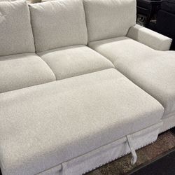 2 Piece Sectional With Pull Out Bed And Storage Chaise On Sale