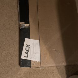 brand new coffee table color black.asking$25 or best ofert