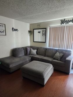 Gray Sectional Couch and Dining Table