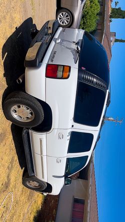 Tahoe Chevy 04 runs good don’t leak don’t overheat. AC works just behind tag.
