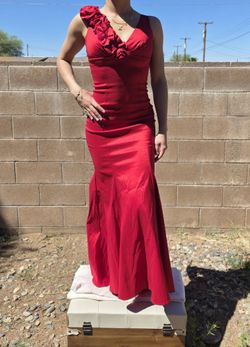 Red, size medium but feels more like a small