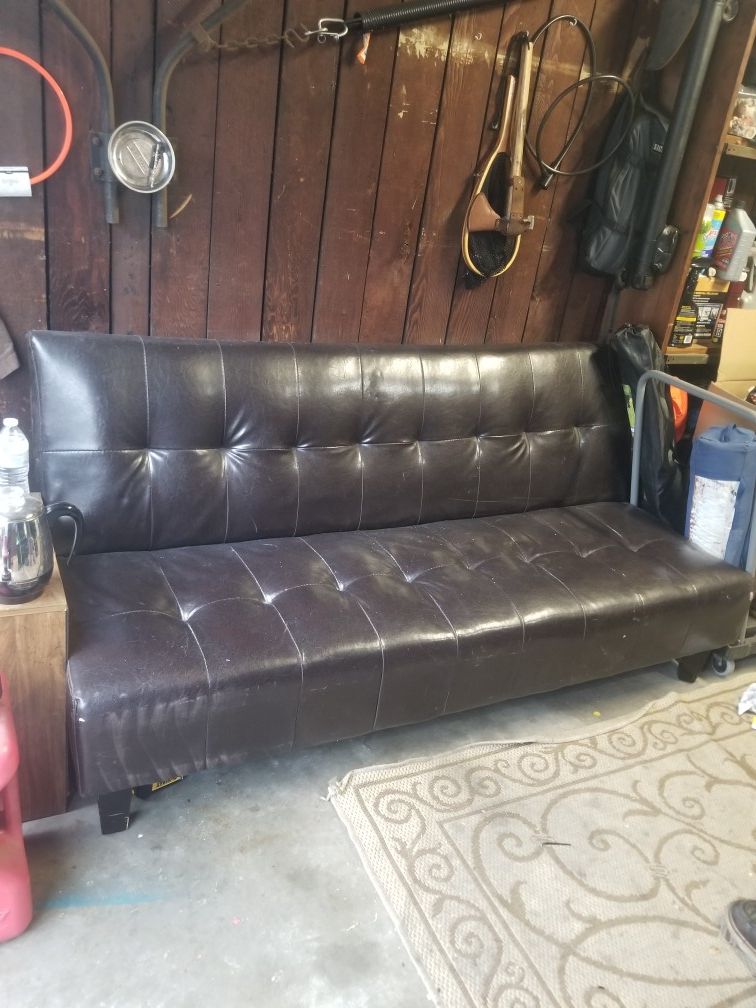 Brown "leather" futon