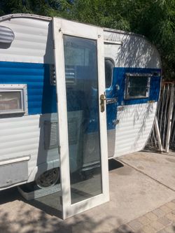 Tall glass door with hinges