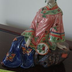 Chinese Shiwan Wucai porcelain figurine of a lady with a fan