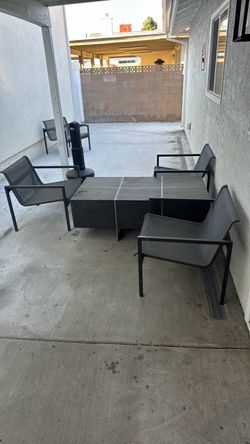 Outdoor coffee table with chairs