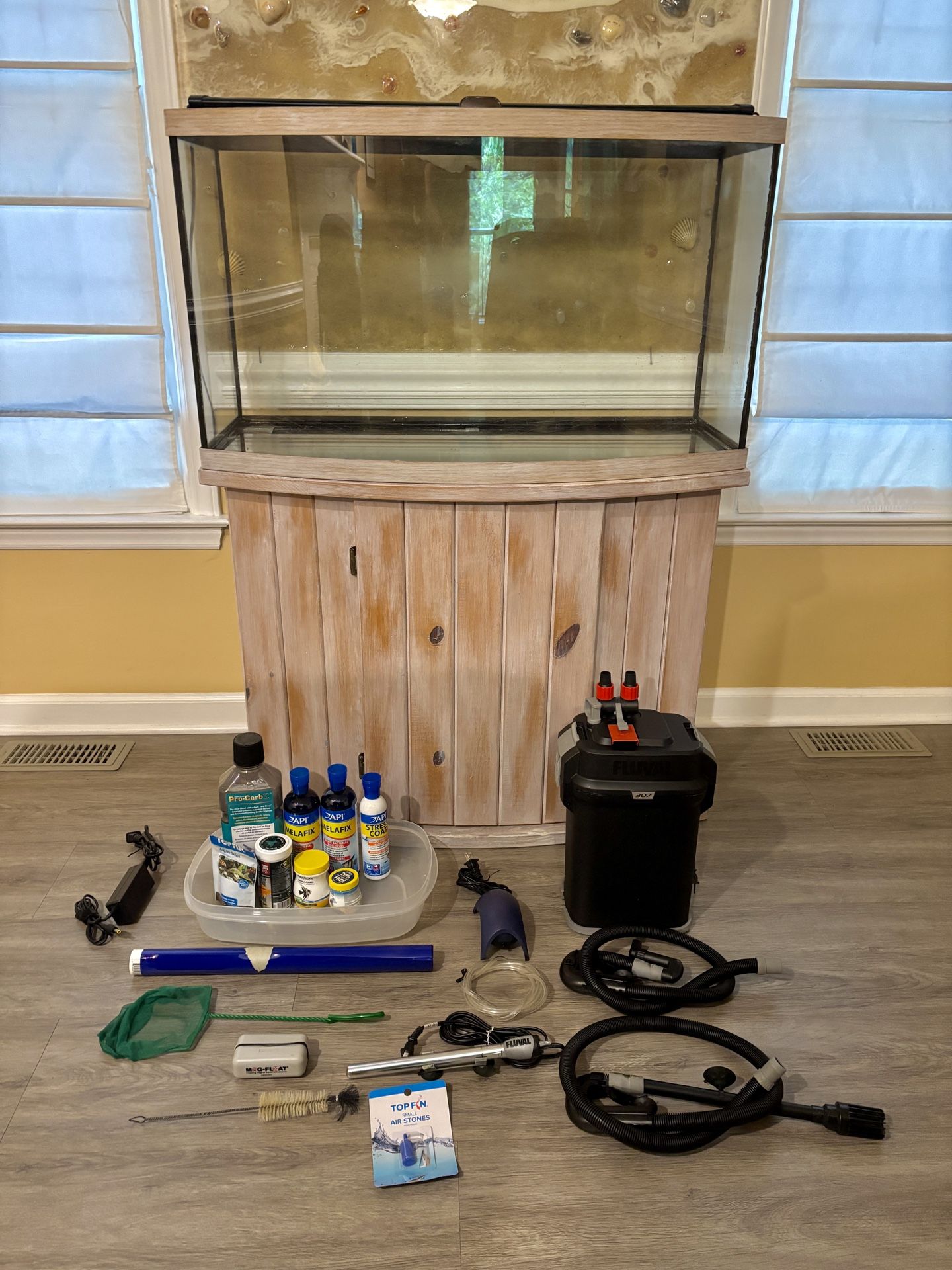 Bow Front Aquarium and Stand for sale