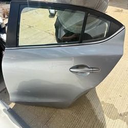 2016 Mazda 3 rear left door sedan