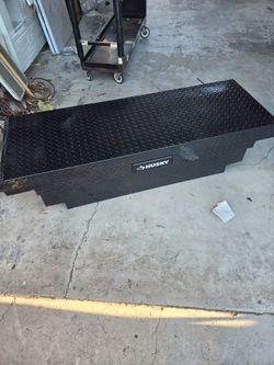 Like New Husky 62 in. Crossover Truck Tool Box in Aluminum, w/ Low Profile for Mid Size Trucks. Retails $530 with Taxes! Small Dent!