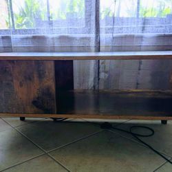 TV Stand  If Its Post Is Still Available!