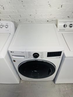LG white washing machine, includes a receipt with a 60-day warranty.