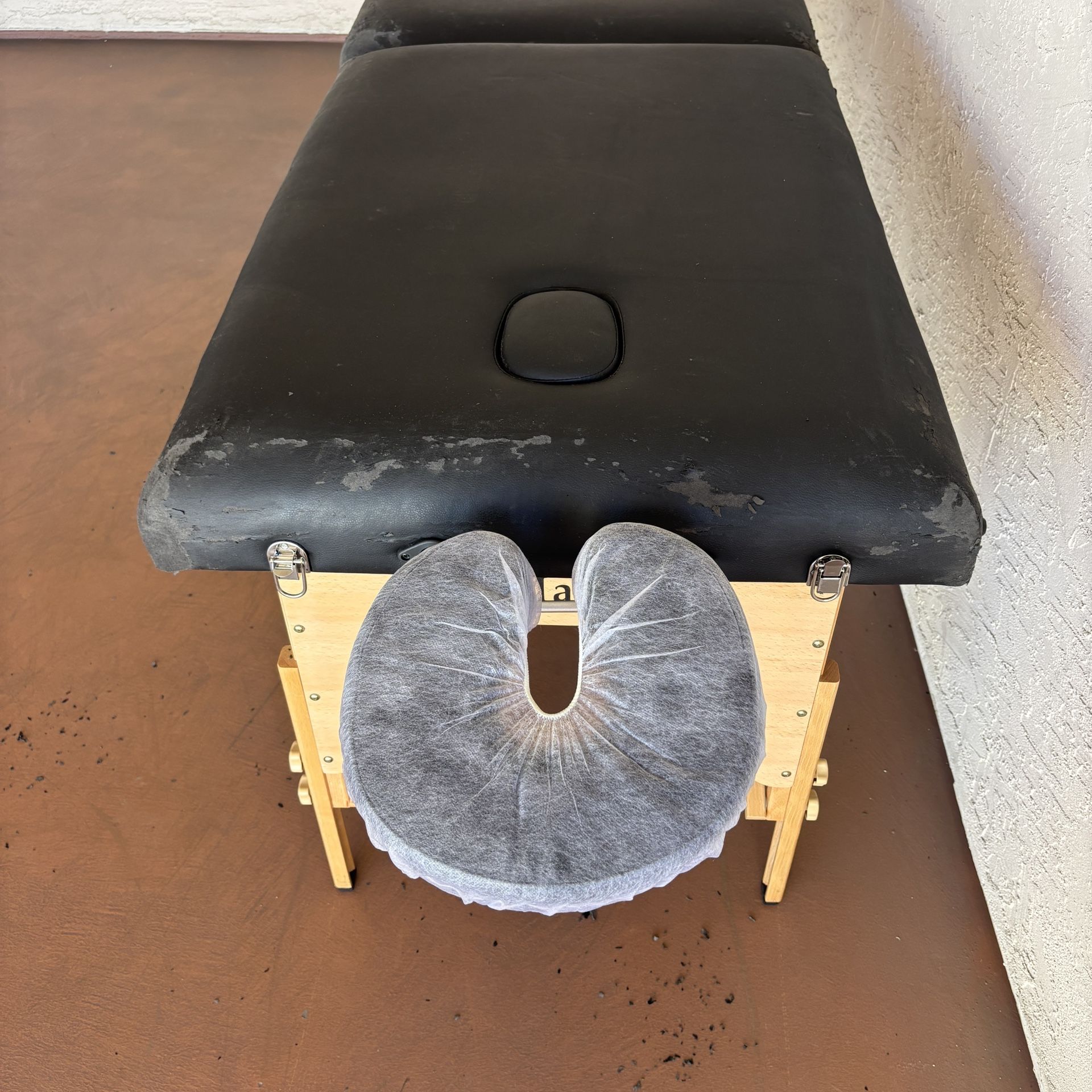 One Black Massage Table With accessories and Black Carrying Case