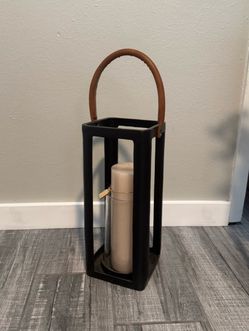 Standing lantern with candle