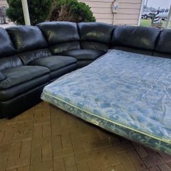 dark gray reclining sectional sofa sleeper. good for garage/shop.