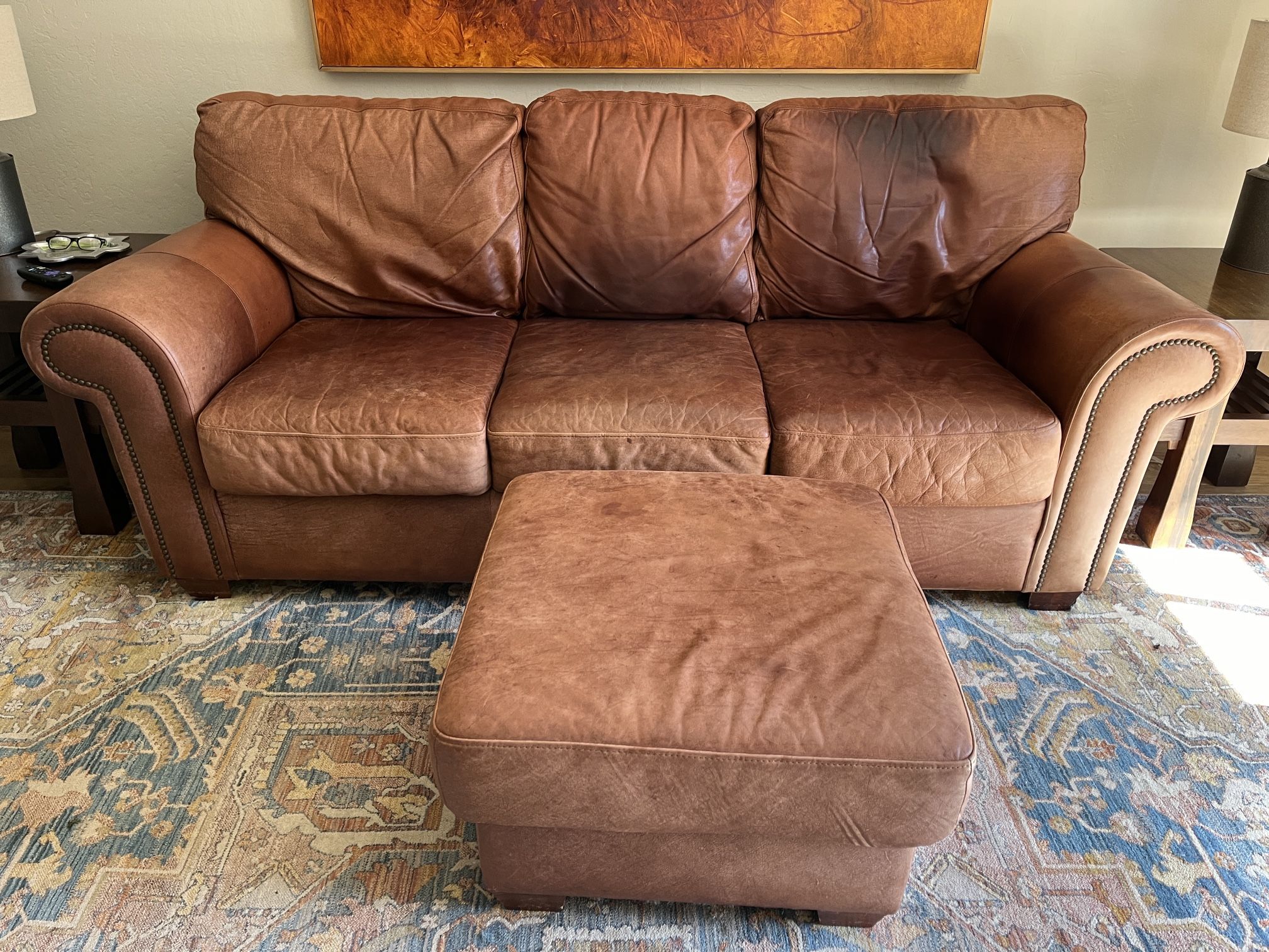 Well Loved Comfortable Leather Sofa and Ottoman