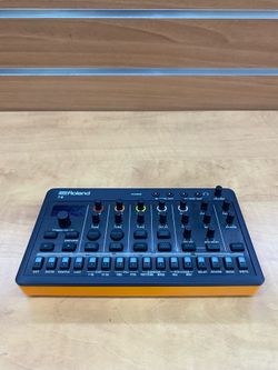 Roland AIRA Compact T-8 Beat Machine, a portable rhythm factory featuring classic R