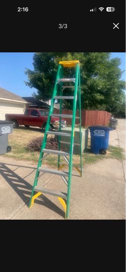 Eight foot metal and fiberglass ladder