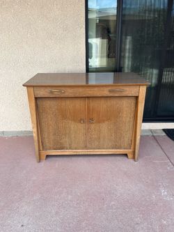 Cabinet with expanded table