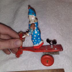 Antique Windup Tin Clown On Trike