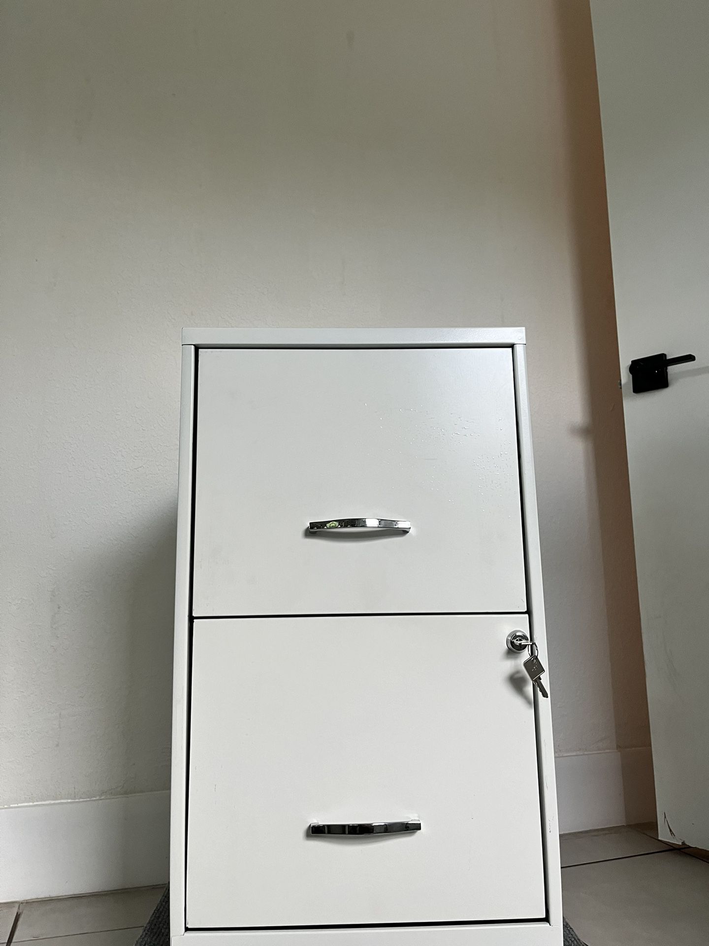 2-drawer white filing cabinet with keys