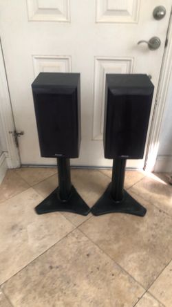 Two pioneer speakers with stands