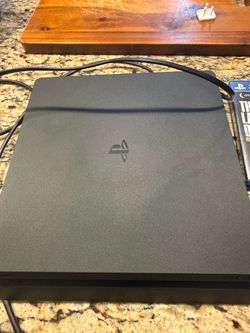 PS4 Slim Bundle – 2 Controllers, Dual Charging Dock & 4 Games (Tested & Working)