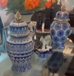 Exquisite Chinoiserie Temple Jars with lids.
