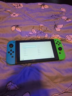 Nintendo Switch with Blue and Green Joy-Cons