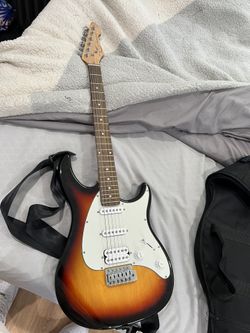 Electric Guitar With Case 