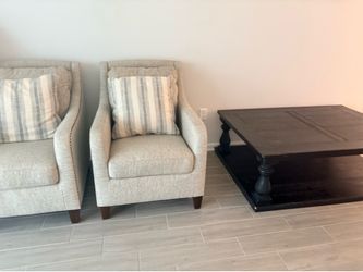 2 chairs plus very heavy coffee table. Must go