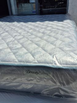 NEW  QUEEN MATTRESS