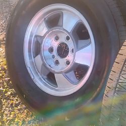 Selling Chevy rims with ok tires