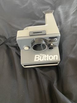 The Button Polaroid Land Camera