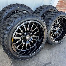 NEW 22x12 gloss black/milled wheels wrapped in RBP 33x12.50r22 tires