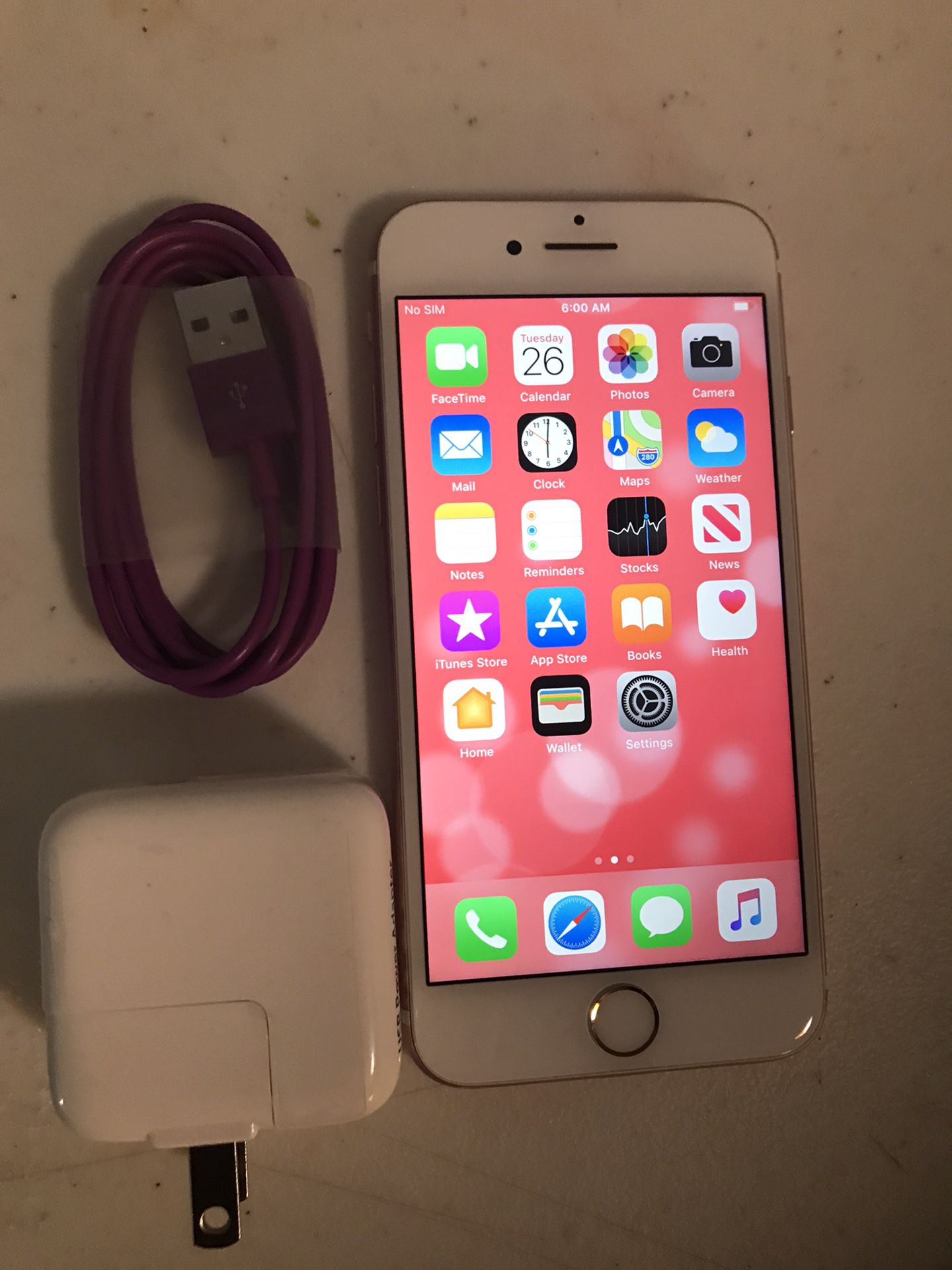 Apple iPhone 7 128 GB unlocked.color gold ROSE.work very well. Included charger.perfect condition.