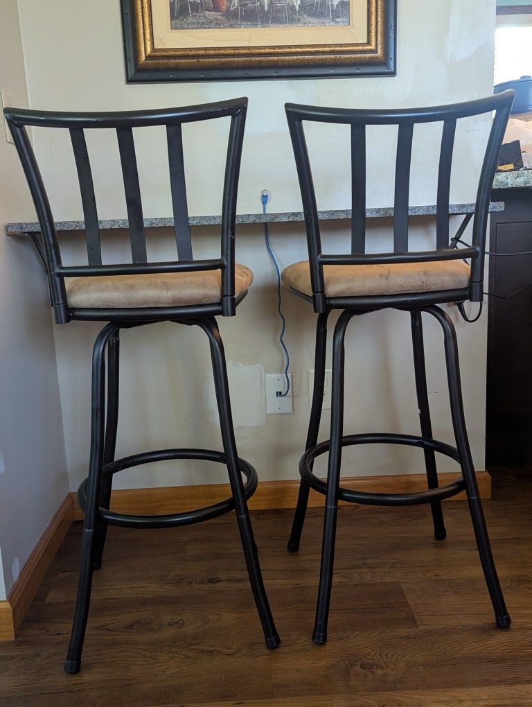 2 Swivel Stools Seat is @ 29" (Bar Height)