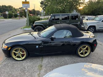 2008 BMW Z4 3.0si   Convertible , 104k low miles with gold rims and navigation.  FINANCING AVAILABLE THROUGH LENDERS! CLEAN CARFAX! CLEAN TITLE!  Just