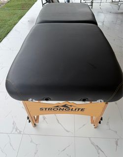 Massage table