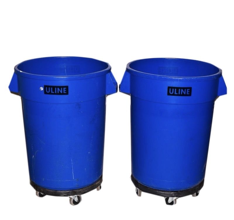 Pair of ULINE royal blue 32 gallon trash cans on removable caster dollies