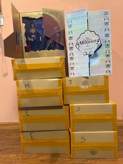 D23 limited designer dolls
