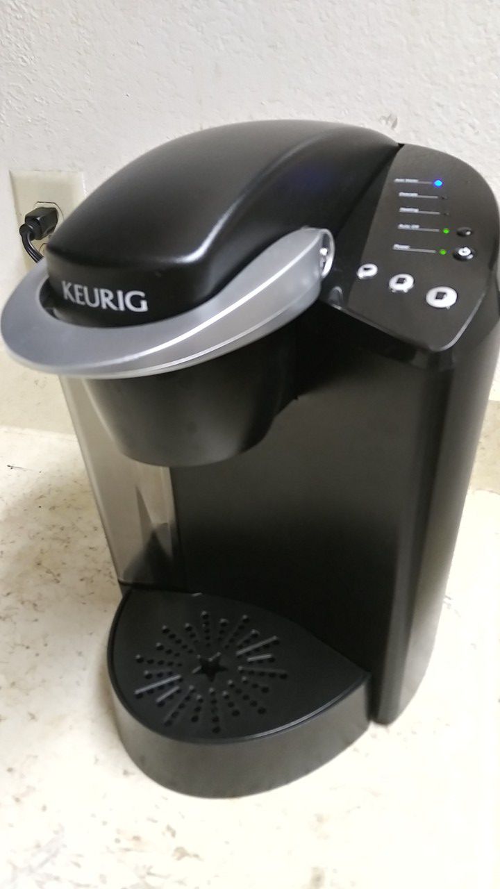 KEURIG COFFEE MAKER IN EXCELLENT CONDITION. WORKS PERFECTLY WELL.