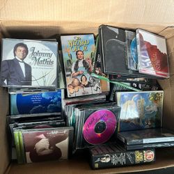 Box Of DVDs And CDS