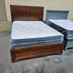 Brown Queen Size Solid Wood Belcourt Bed Frame With Brand New Queen Size Plush Beautyrest Mattress And Box Spring In Plastic 