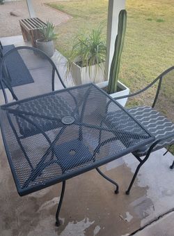 Bistro table, chair set and cushions