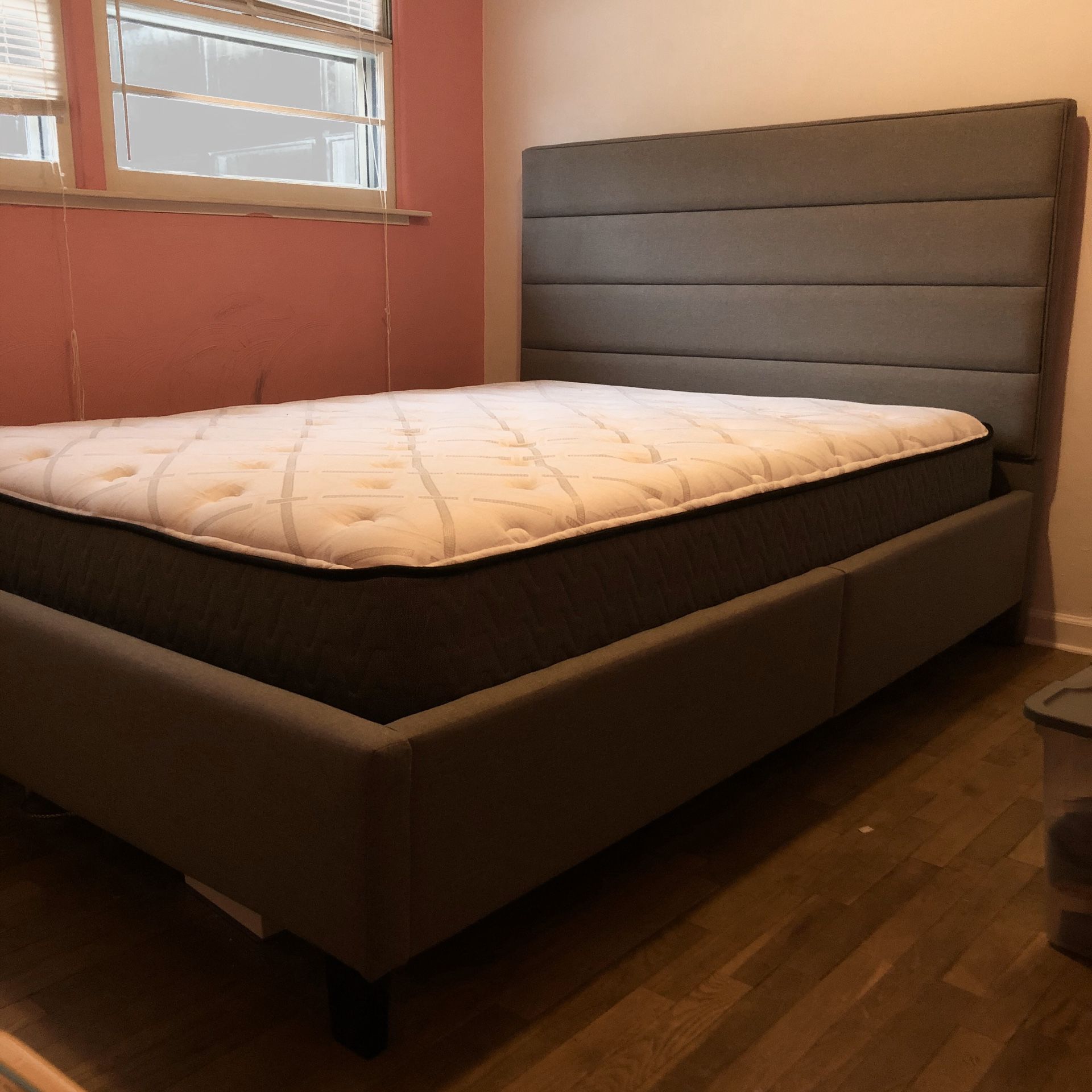 Queen mattress, boxspring and bed frame.