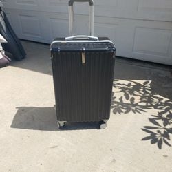 Suitcase  - Hardcase With Lock And On 4 Wheels